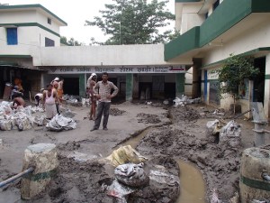 A ditch draining water from the classrooms